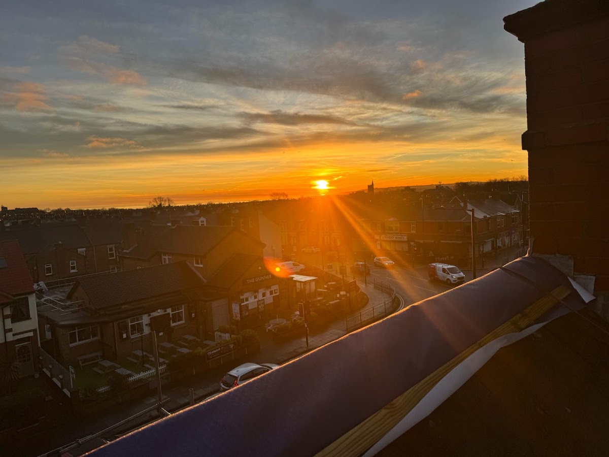 Sunset over the rooftops of North Shields, photographed from the scaffold